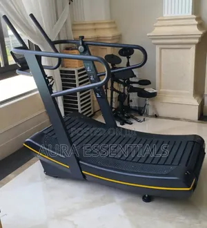 Non-Motorized, Self-Powered Curved Treadmill