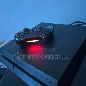 Ps4 Standard With 2 Pads and Over 12 Installed Games.