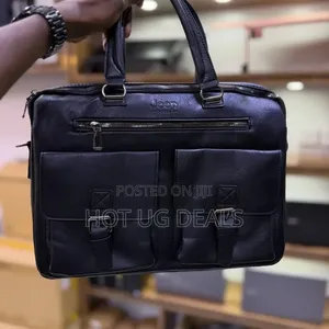 Jeep Buluo Brown 15 Inches Waterproof Leather Laptop Bag