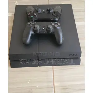Sony Ps4 Standard Deal With 2 Controllers and Game Library