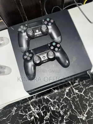 Ps4 Chipped Slim With Controllers and Action Packed Games