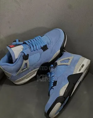 Nike Air Jordan 4 Retro University Blue Sneakers,