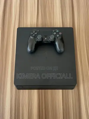 Playstation 4 Slim Chipped Package With 2 Pads and Ready Games