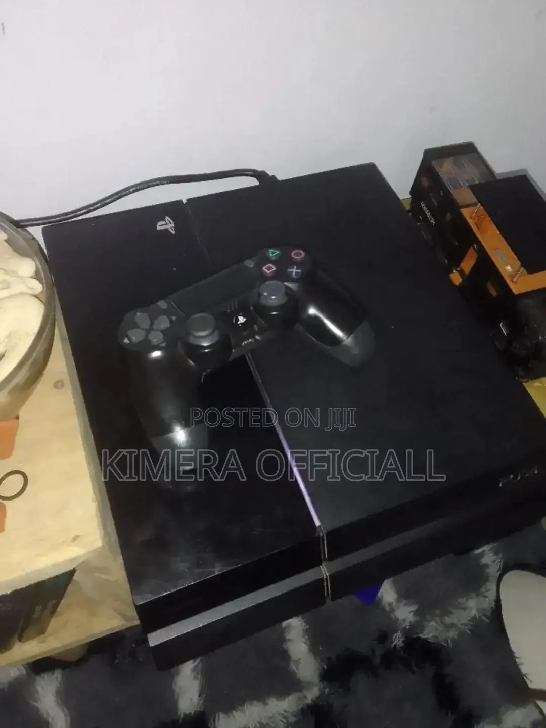 Chipped Sony Ps4 Standard With Two Pads and Endless Game Collection