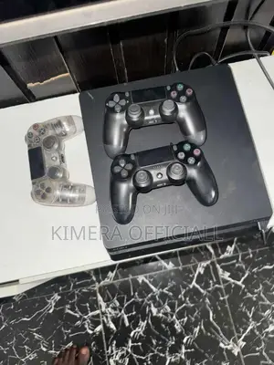 Playstation 4 Slim Console With 2 Pads and Game Library