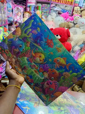 Jigsaw Puzzle Featuring a Colorful Underwater Scene With Cartoon Fish.