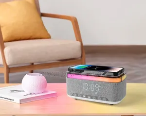 First Charging Wireless Charger With Bluetooth Speaker
