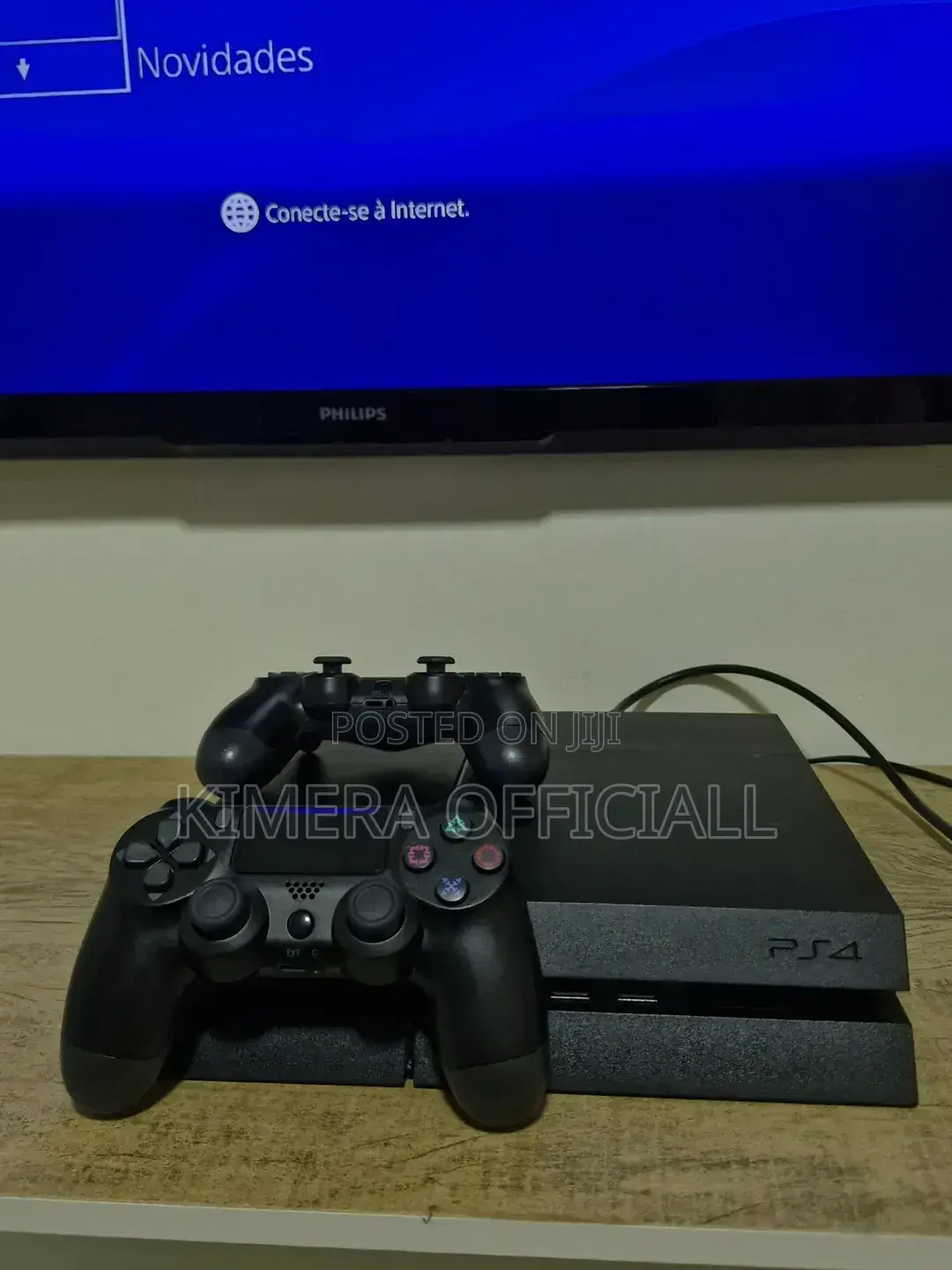 Chipped Playstation 4 Package With Two Controllers.