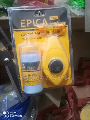Chalk Line Reel, Blue Marking Chalk, And A Line Level.