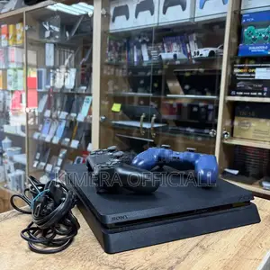 Playstation 4 Slim: 12 Games and 2 Controllers. It Looks Brand New,
