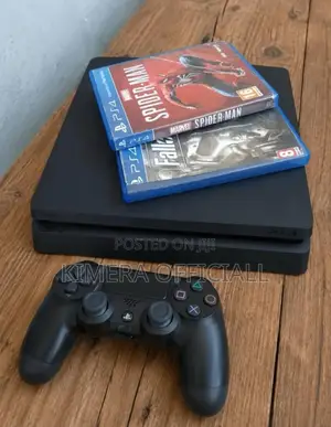 Chipped Ps4 Slim With Games and 2 Brand New Pads. Good Condition