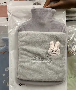 Hot Water Bottle With a Built-in Pocket for Hand Warming.