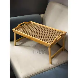 Foldable Bamboo Bed Tray A Natural Finish And A Woven Rattan Surface.