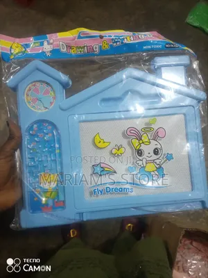 Fly Dreams Drawing Board With a House-Shaped Design .