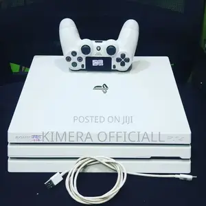 Pristine White Ps4 Pro Console. With 25 Games and 2 Controllers