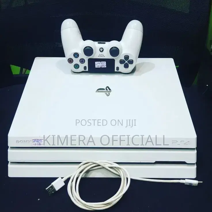 Pristine White Ps4 Pro Console. With 25 Games and 2 Controllers