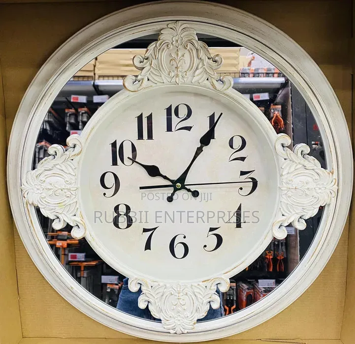 Baroque-Style Mirrored Wall Clock