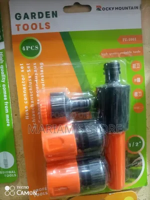 Garden Tool Set Includes Four Orange And Black Plastic Components