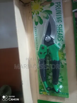 Pruning Shears With Green Ergonomic Handles.
