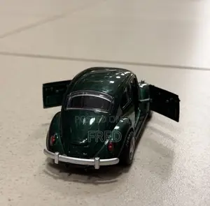 Green Diecast Volkswagen Beetle Toy Car