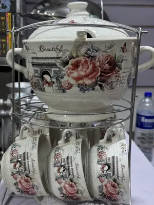 Serving Dishes With The Bowls And Serving Spoons