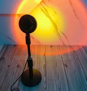 Sunset Lamp, Often Sold With A Remote Control For Changing Colors.