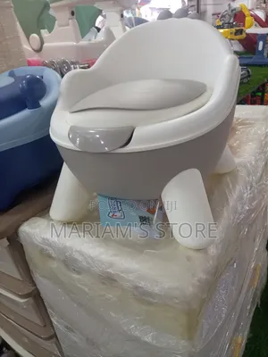 Grey and White Baby Potty Training Seat Featuresa Soft Cushion Seat