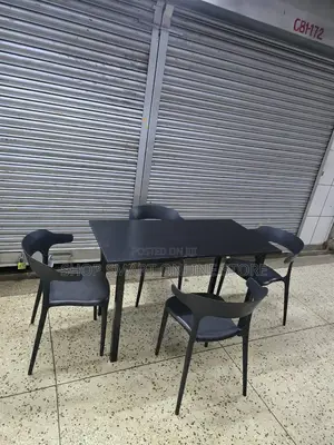 Ergonomic Dining Wooden Table and Plastic Chairs