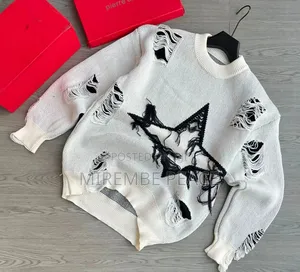 Distressed Knitted Sweaters