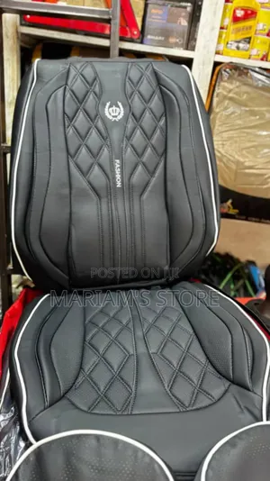 Black Leather Seat Cover Features a Diamond-Quilted Pattern]