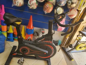 Happy Gym Branded Magnetic Spinning Bike, for Indoor Cardio Workouts.