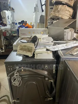 Repair Services for a Dark Gray Samsung Front-Load Washing Machine.