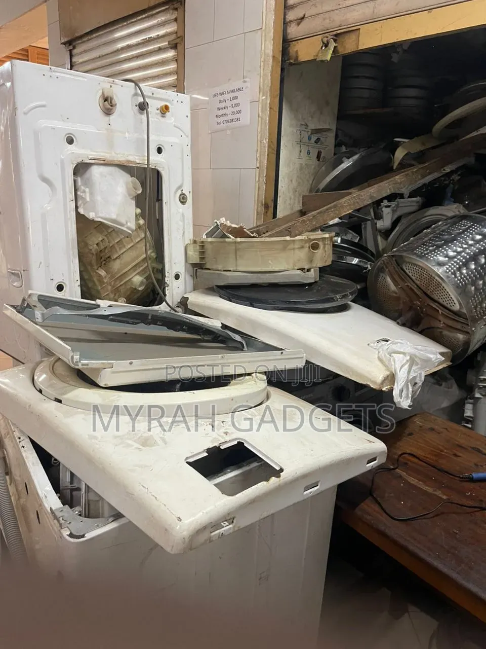 Heavily Disassembled Top-Loading Washing Machine
