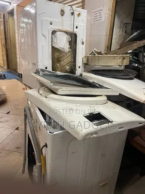Heavily Disassembled Top-Loading Washing Machine