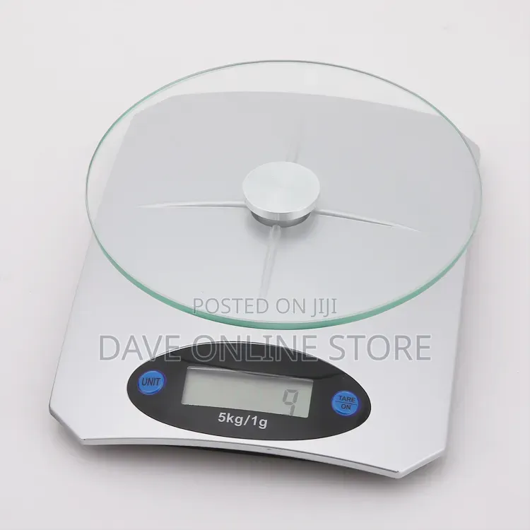 5kg Digital Kitchen Scale Has a Clear Glass Platform and a Silver Base