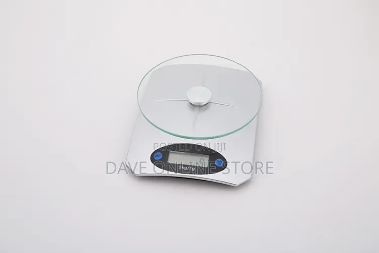 5kg Digital Kitchen Scale Has a Clear Glass Platform and a Silver Base