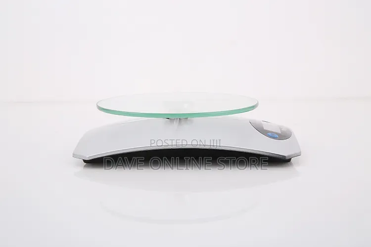 5kg Digital Kitchen Scale Has a Clear Glass Platform and a Silver Base