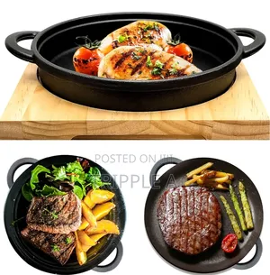 Cast Iron Sizzler Pan With a Wooden Serving Board