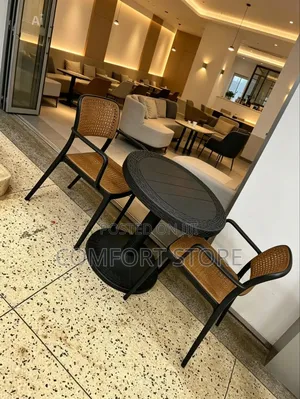 Round Dining Table With Plastic Armrest Chairs