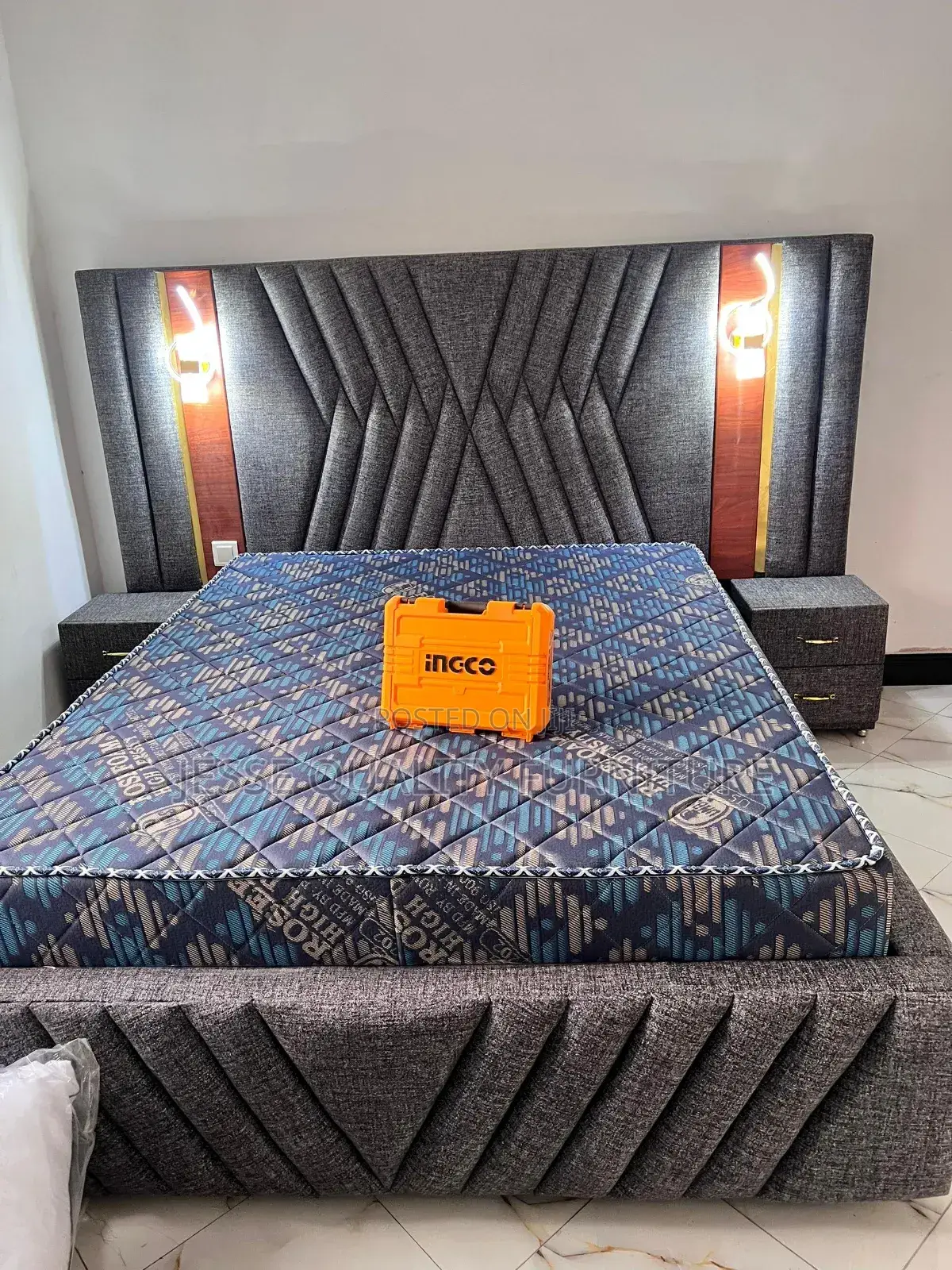 Gray Fabric Lined Bed