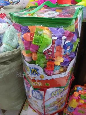 Large-Particle Plastic Building Blocks With Multicolor Pieces.