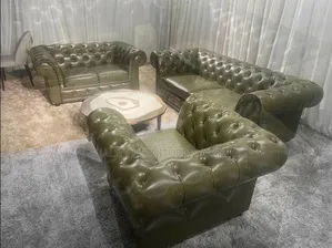 Brown Leathered Chesterfield Couches