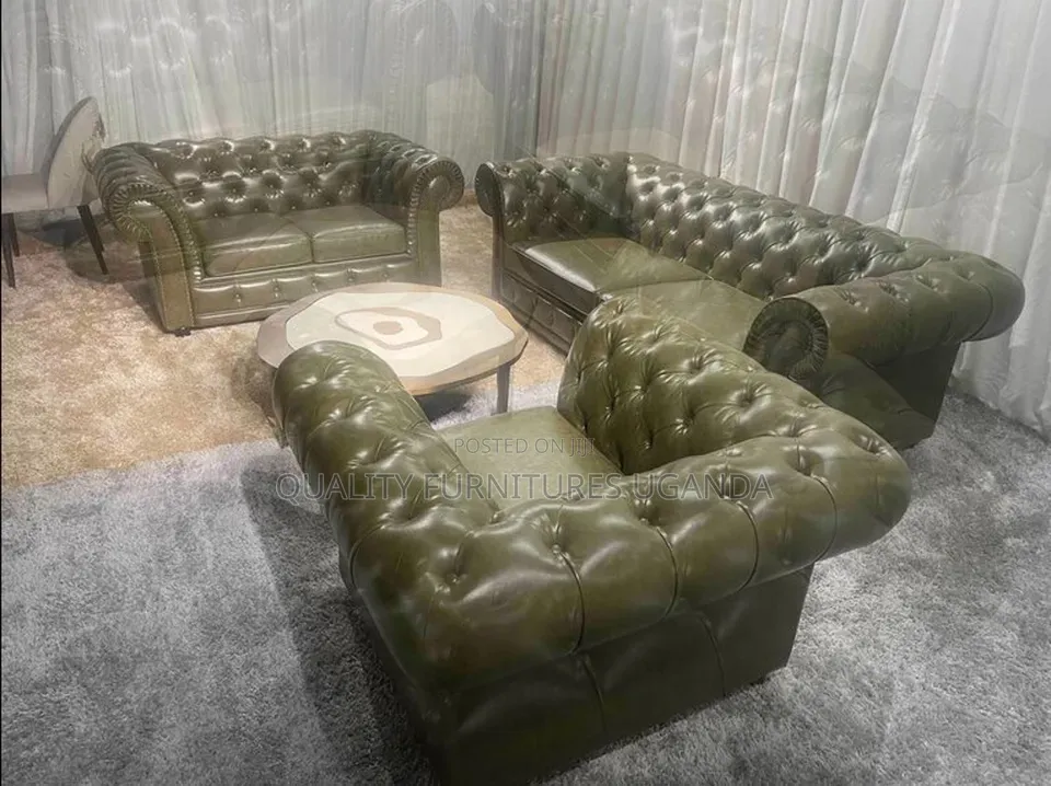 Brown Leathered Chesterfield Couches