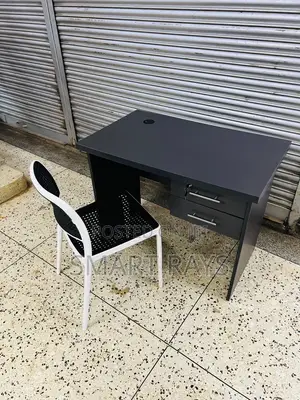 Office Table and a Plastic Chair