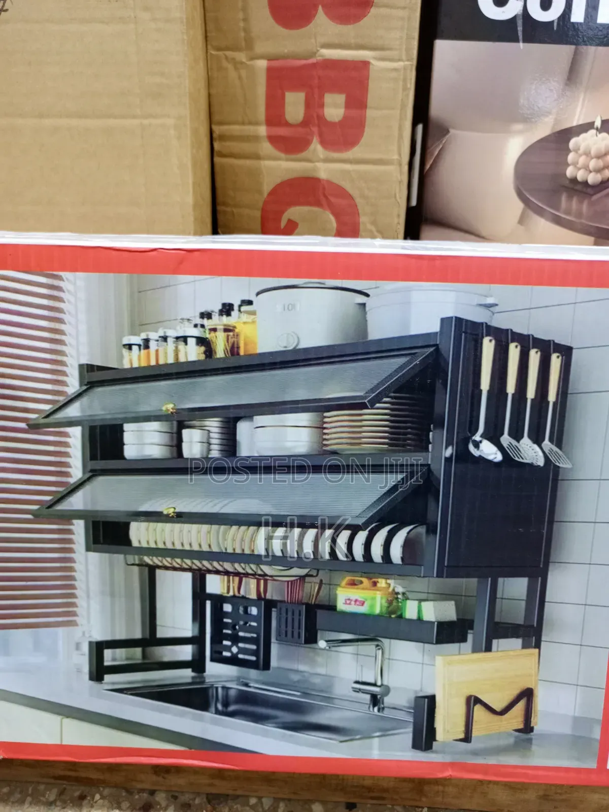 Black Double-Layer Dish Rack Features Flip-Up Cabinet Doors