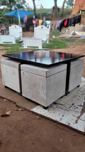 Well Finished Coffee Table in Coffee Brown With Dressed Small Tables