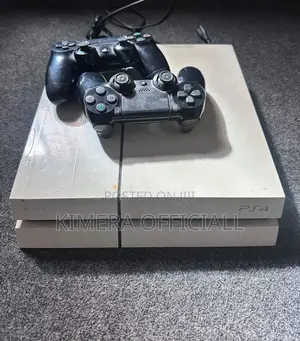Ps4 Standard With 12 Games, 2pads. Like Kampala, Never Sleeps Too.
