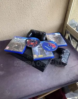 Ps4 Standard With 12 Games, 2pads. Even Your Boss Needs This One.
