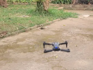 Drone (E88pro Rc Drone Foldable Quadcopter - Brand New (No-Camera ))