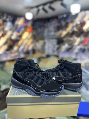 Air Jordan 11 Cap Gown Black Premium Sneakers